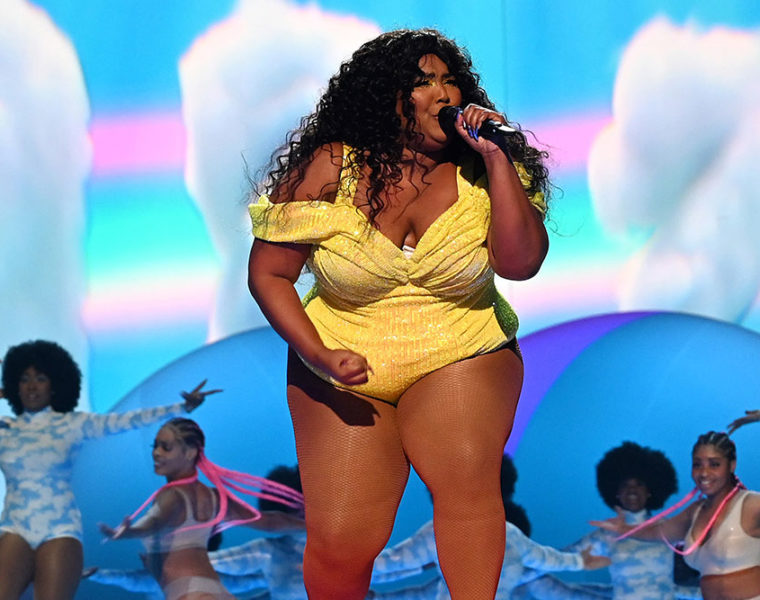 Lizzo preforms on stage