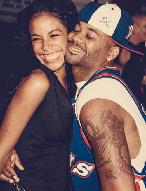 Dame Dash at his happiest, in hug with later singer, Aaliyah