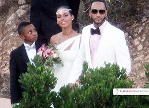 Alicia Keys and husband Swiss Beats pose for pictures after their wedding